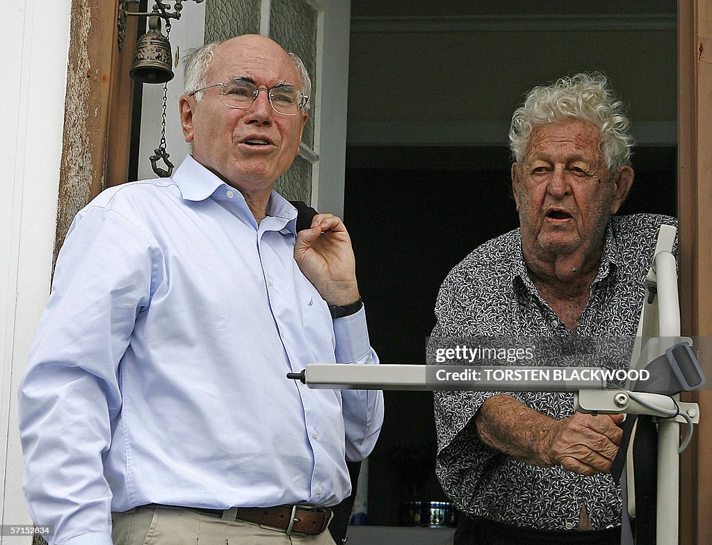 Australian Prime Minister John Howard (L