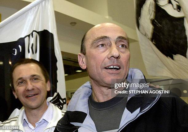 French Corsican militants Jean Castela and Vincent Andriuzzi are pictured 21 March 2006 upon their arrival at Bastia airport, Corsica, southern...