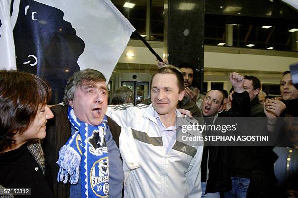 French Corsican militant Jean Castela is welcomed by his wife Stella and his lawyer Vincent Stagnara and well-wishers, 21 March 2006 upon his arrival...