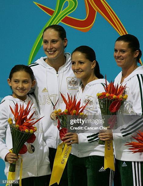 Melissa Wu and Alexandra Croak of Australia, Loudy Tourky and Chantelle Newbery of Australia pose on the podium with their medals in the Women's...
