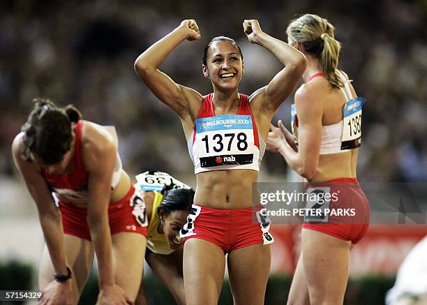 Jessica Ennis of England reacts after her teammate Kelly Sotherton won the heptathlon title at the Commonwealth Games in Melbourne as teammate Julie...