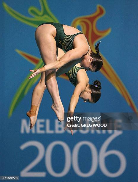Chantelle Newbery and Loudy Tourky of Australia perform in the women's 10m synchro platform diving at the Melbourne Sports and Aquatic Centre, 22...