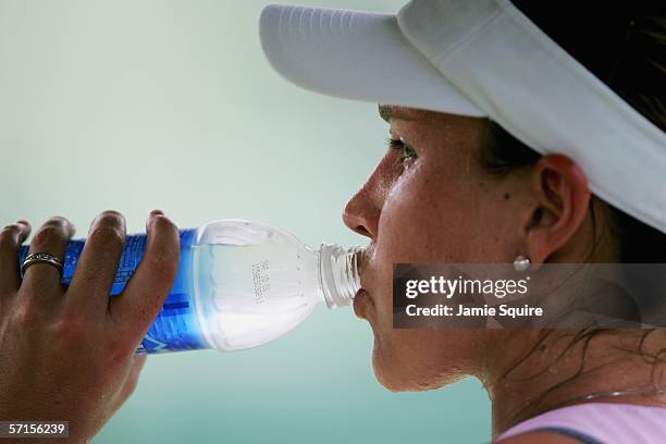 Ashley Harkleroad takes a drink of the Nasdaq 100 Open, part of the WTA Sony Ericsson Tour, at the Tennis Center at Crandon Park on March 22, 2006 in...