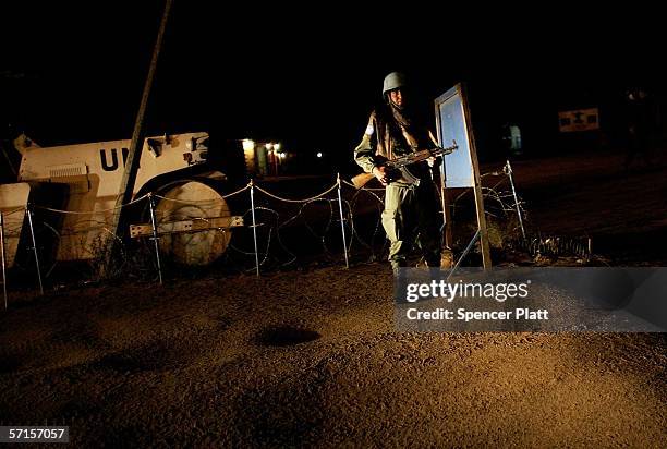 Member of a Moroccan contingent of United Nations peace keepers participates in a night patrol March 22, 2006 in Bunia, Congo. Over 17,000 U.N. Peace...