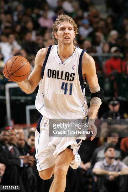 Dirk Nowitzki of the Dallas Mavericks drives against the Toronto Raptors during the game at American Airlines Center on February 25, 2006 in Dallas,...