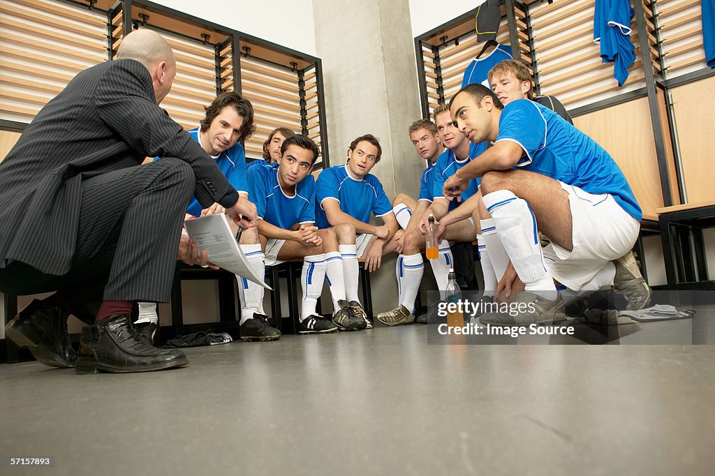 Coach with football team