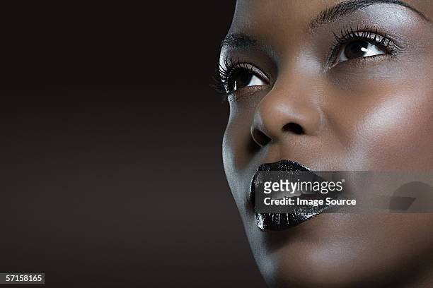 face of a young woman - beautiful woman lipstick stock pictures, royalty-free photos & images