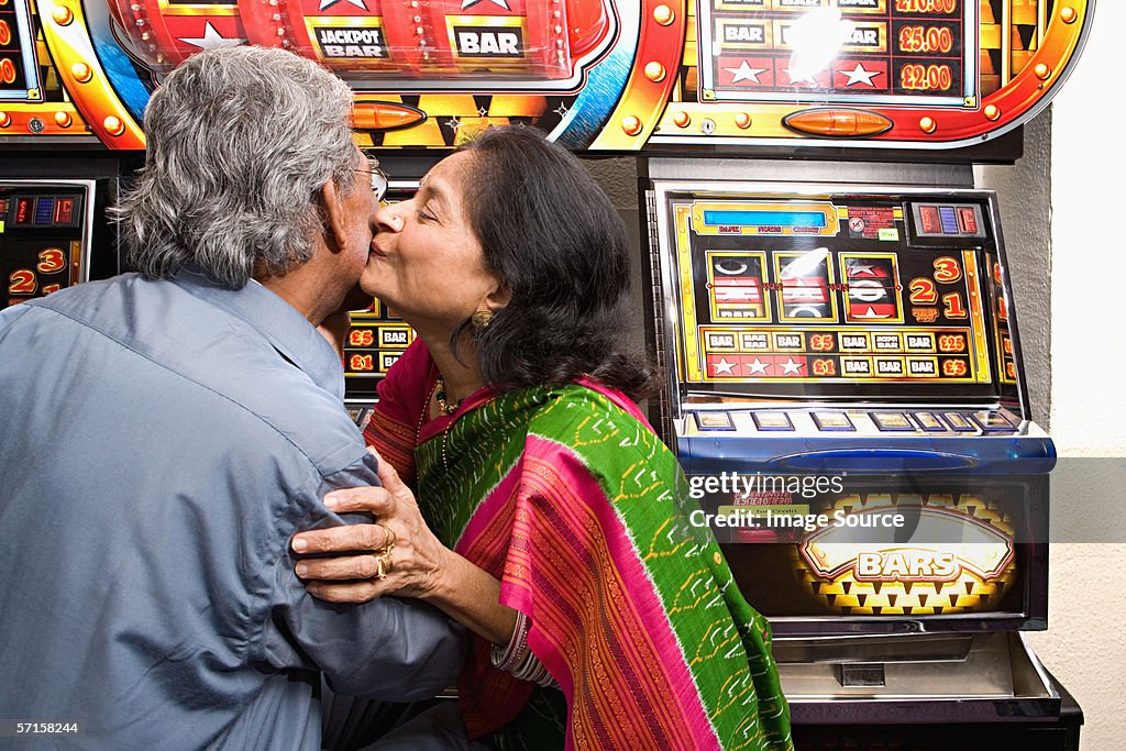 Couple in an amusement arcade