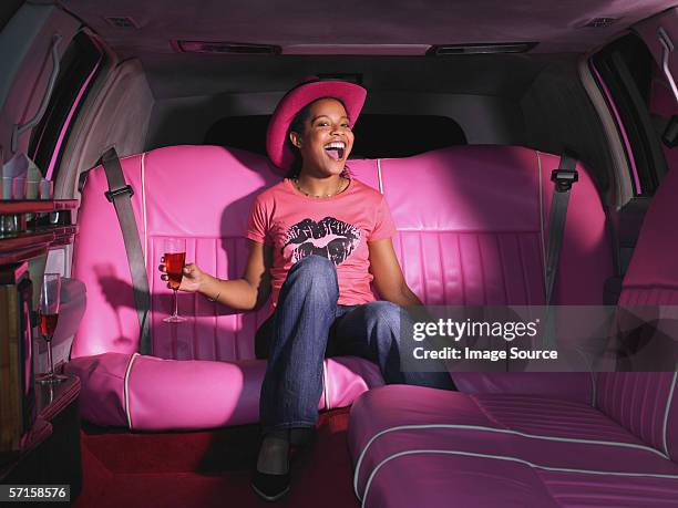 woman in limousine - tinted window stock pictures, royalty-free photos & images