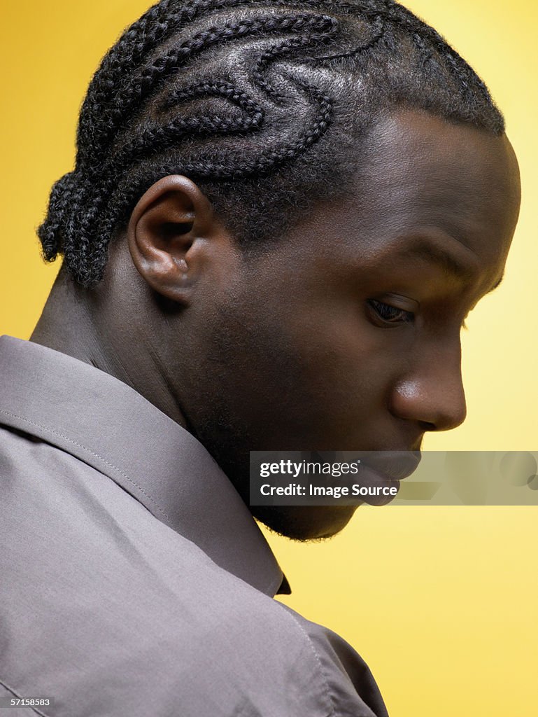 Man With Cornrow Hairstyle High-Res Stock Photo - Getty Images