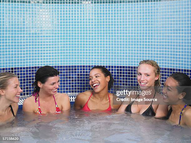 five women in hot tub - hot tub party stock pictures, royalty-free photos & images