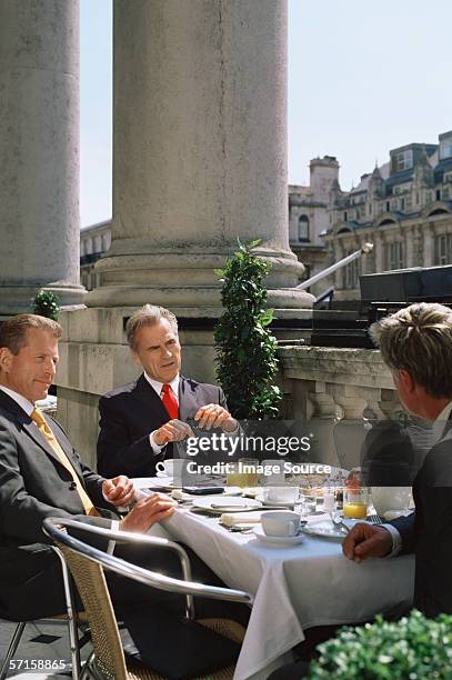 businessmen in a restaurant - only mature men imagens e fotografias de stock