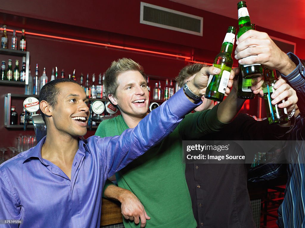 Men drinking in a bar