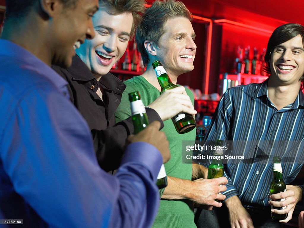 Men drinking in a bar
