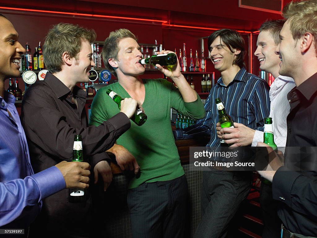 Men drinking in a bar