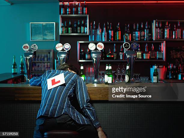 man asleep at bar - passed out drunk stockfoto's en -beelden