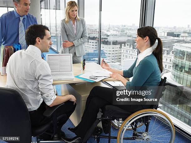 office workers in meeting - 4 women stock pictures, royalty-free photos & images