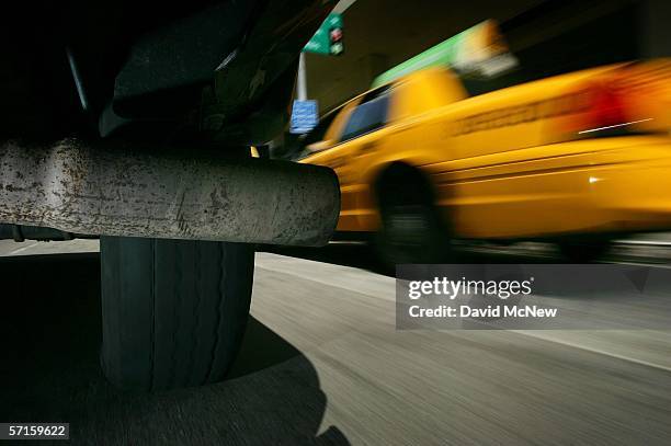 The tailpipe of a vehicle is seen next to a taxi and contributing emissions that are the nation?s second worst on March 22, 2006 in Los Angeles,...