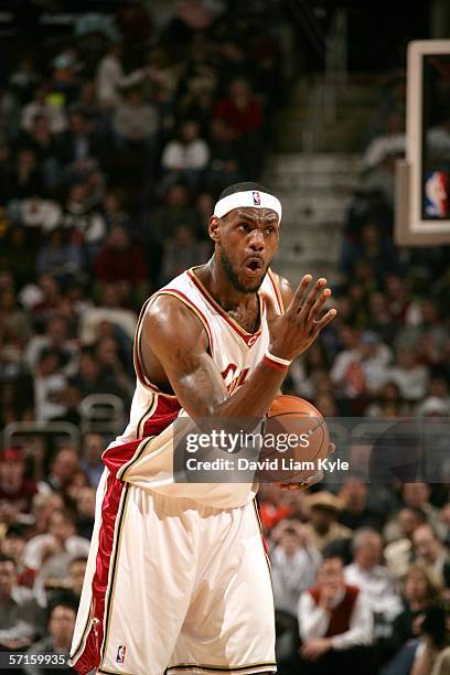 LeBron James of the Cleveland Cavaliers directs his teammates for a play against the Charlotte Bobcats on March 22, 2006 at The Quicken Loans Arena...