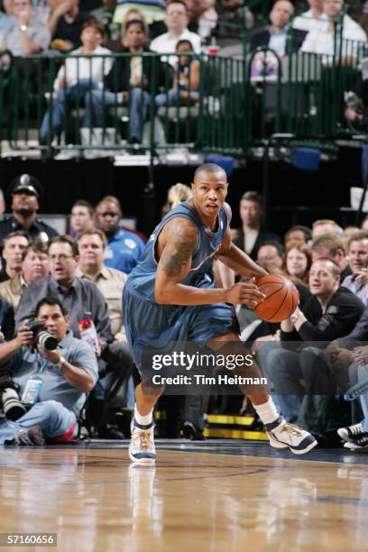 Caron Butler of the Washington Wizards moves the ball against the Dallas Mavericks at the American Airlines Center on February 15, 2006 in Dallas,...