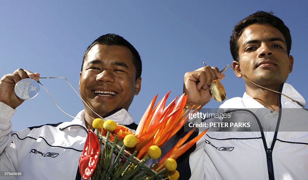 Indian Kumar Indian shooter Vijay Kumar and compatriot Pemba Tamang display their ...