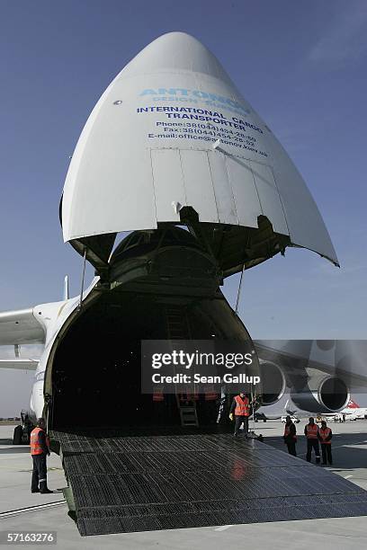 An Antonov AN-124-100 giant caro transport jet stands with its front cargo door open at the Leipzig-Halle international airport March 23, 2006 in...