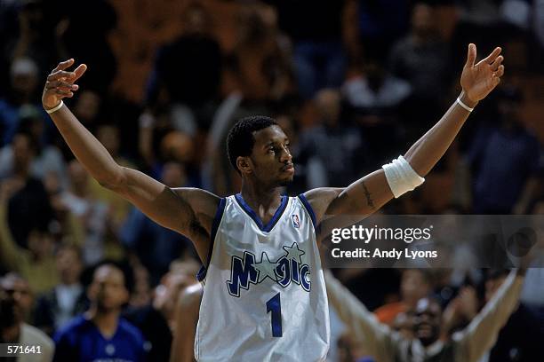 Tracy McGrady of the Orlando Magic walks out to the court during the game against the Boston Celtics at the TD Waterhouse Centre in Orlando, Florida....