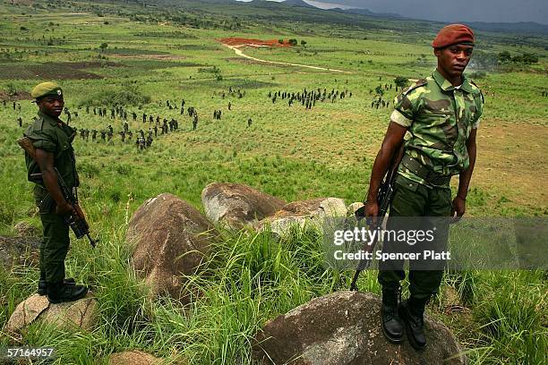 Soldiers, the national army of the Democratic Republic of Congo, stand as they participate in training exercises March 23, 2006 in Bunia, Congo. The...