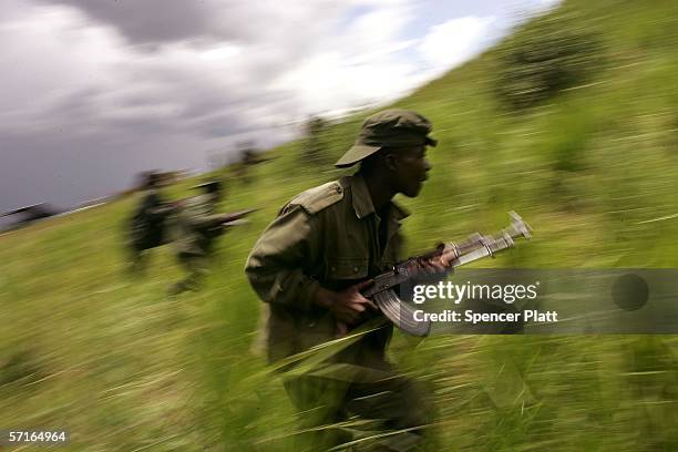 Soldiers, the national army of the Democratic Republic of Congo, participate in training exercises March 23, 2006 in Bunia, Congo. The FARDC have...