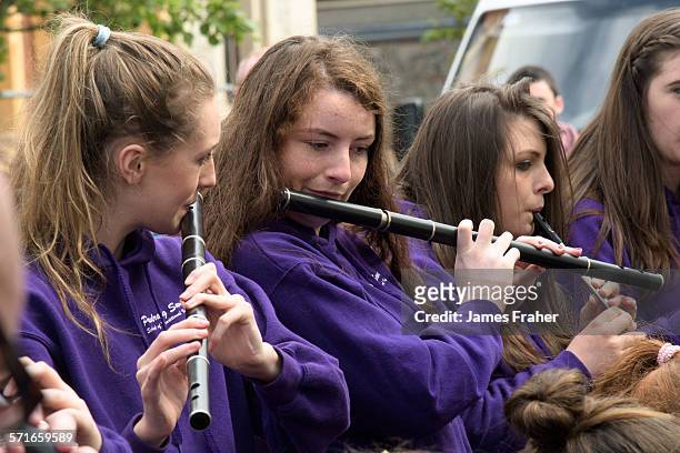 Flute and tin whistle players from Ceoltoiri Lough Allen perform on the street at the Fleadh Cheoil 2015 on August 14, 2015 in Sligo, Ireland.