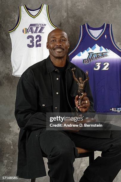 Retired power forward Karl Malone poses after the unveiling his statue commissioned by Utah Jazz owner Larry H. Miller on March 23, 2006 at the Delta...