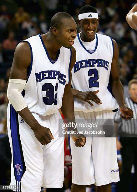 Joey Dorsey and Robert Dozier of the Memphis Tigers celebrate during the Sweet 16 game of the NCAA Division I Men's Basketball Tournament against the...
