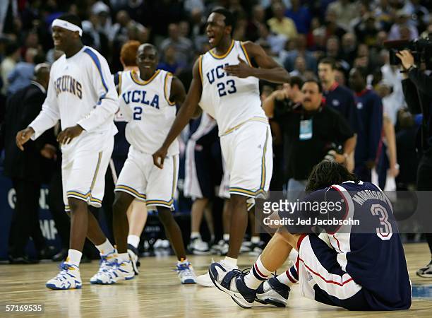Adam Morrison of the Gonzaga Bulldogs hangs his head after losing to the UCLA Bruins during the third round game of the NCAA Division I Men's...