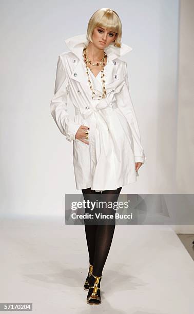 Model walks the runway at the Meghan Fall 2006 show during the Mercedes Benz Fashion Week at Smashbox Studios on March 23, 2006 in Culver City,...