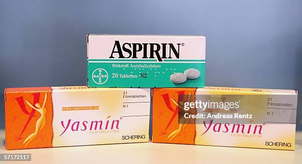 Packages of Bayer aspirin and Schering Yasmin contraceptive pills lie on a table at a pharmacy on March 24, 2006 in Berlin, Germany. Schering...