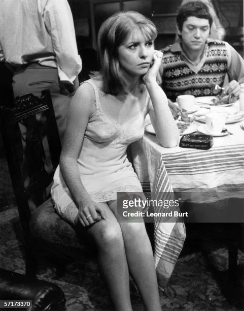 Jane Asher plays Alison Porter in a new production of John Osborne's 'Look Back in Anger' at the Royal Court Theatre, 24th October 1968. Behind her...