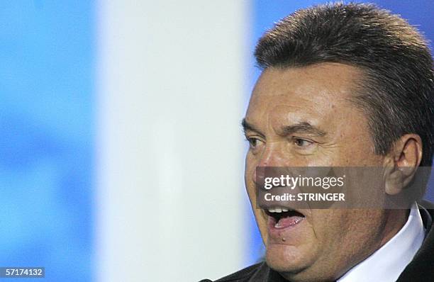 Viktor Yanukovych, who leads the polls for Ukraine's key parliamentary election 26 March, addresses supporters at a rally in central Kiev, 24 March...