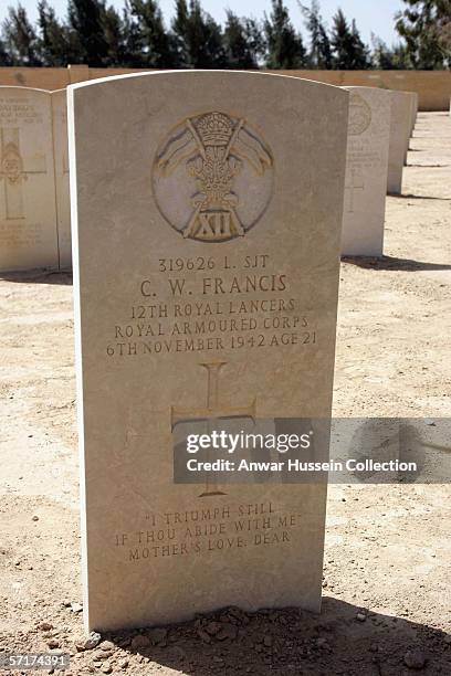 The grave of C.W. Francis is seen during a visit to the Commonwealth War Graves Cemetry on the fifth day of TRH Prince Charles, Prince of Wales and...