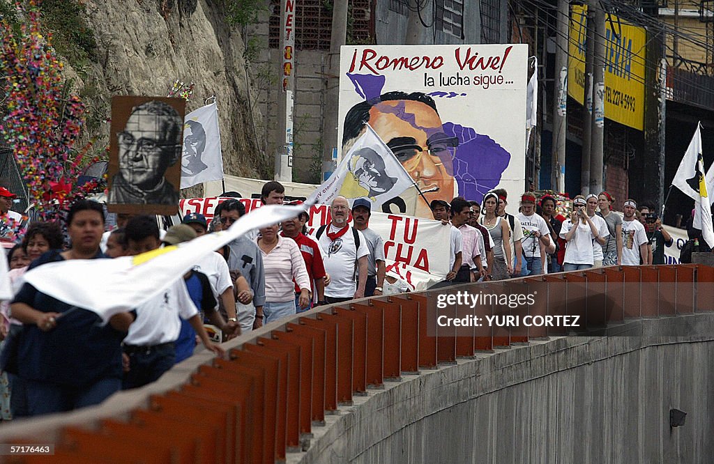 People take part in a rally to commemora