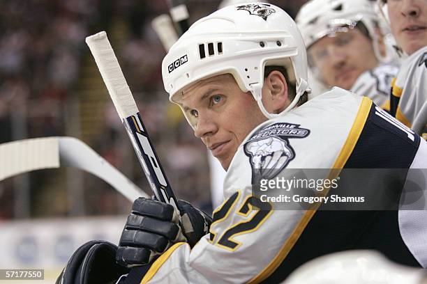 Greg Johnson of the Nashville Predators looks on from the bench during the game against the Detroit Red Wings on March 21, 2006 in Detroit, Michigan....