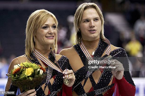 Albena Denkova and Maxim Stavinski of Bulgaria pose with their gold medals in the Ice Dancing Free Dance during the ISU World Figure Skating...