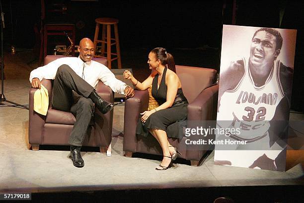 Karl and Kay Malone sit on stage during a Charity Roast for the retired NBA power forward March 24, 2006 at the Depo Club in Salt Lake City, Utah....