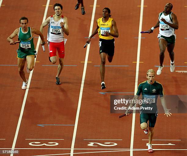 Australian relay team member Clinton Hill celebrates winning the men's 4x400 metre relay final at the athletics during day ten of the Melbourne 2006...