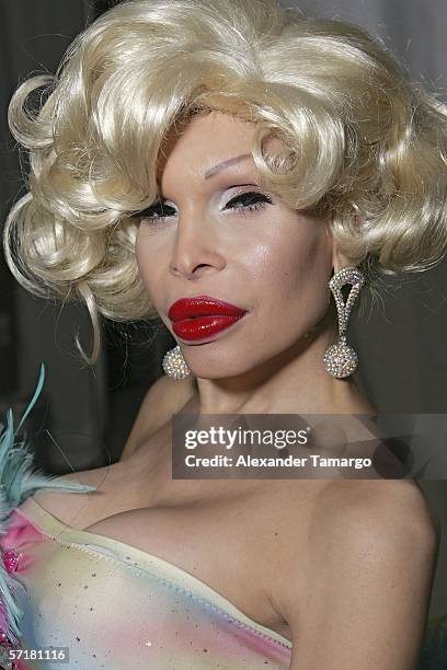 Actress Amanda Lepore poses backstage before the Heatherette fashion show during FUNKSHION fashion week on March 24, 2006 in Miami Beach, Florida.