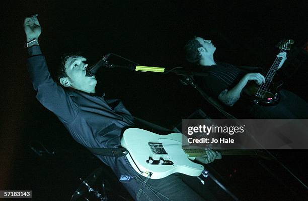 Sam Preston,James Gregory of Brighton indie-pop quartet The Ordinary Boys performs on stage at the London stop of their UK tour, at Carling Academy...