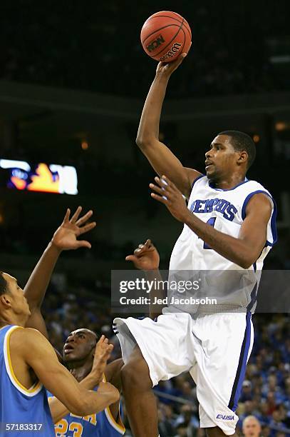 Shawne Williams of the Memphis Tigers puts up a shot over the UCLA Bruins during the third round game of the NCAA Division I Men's Basketball...