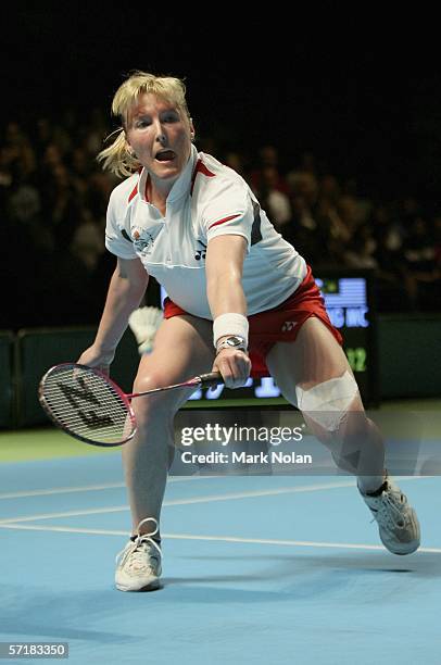 Tracey Jayne Hallam of England hits a return to Mew Choo Wong of Malaysia during the final of the women's singles badminton match on day eleven of...