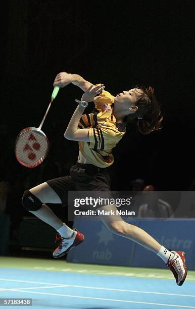 Mew Choo Wong of Malaysia hits a return to Tracey Jayne Hallam of England during the final of the women's singles badminton match on day eleven of...