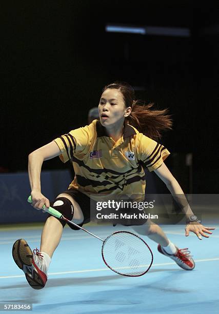 Mew Choo Wong of Malaysia hits a return to Tracey Jayne Hallam of England during the final of the women's singles badminton match on day eleven of...
