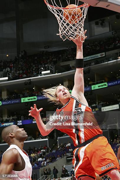 Chris Kaman of the Los Angeles Clippers puts a shot up against the Washington Wizards on March 25, 2006 at Staples Center in Los Angeles, California....